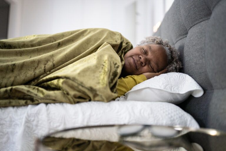 Senior woman sleeping at home